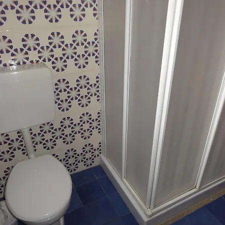 Апартаменты Flat In A With Private Garden Бибионе
